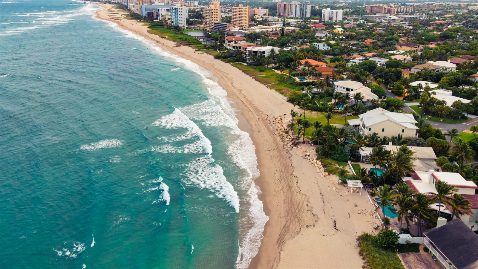 Aerial view of a Florida beach and turquoise surf